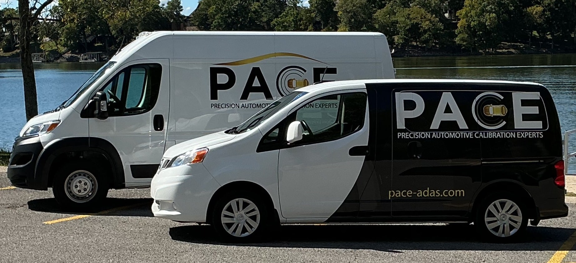 A picture of the two mobile mechanic vans